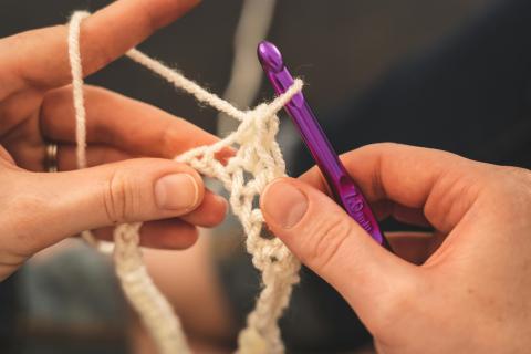 hands crocheting